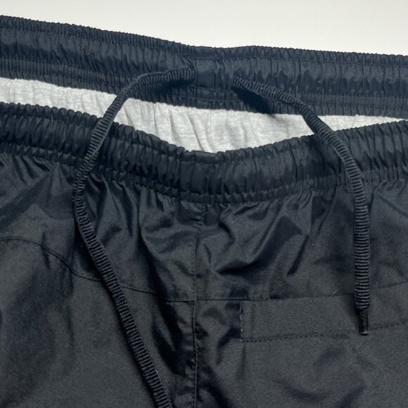 Nike Windrunner Women's High-Waisted Zipper Open-Hem Pants - Picture 13 of 13